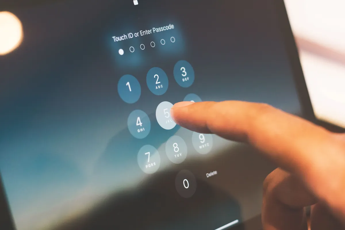 Passcode screen used to illustrate safer account-access checks