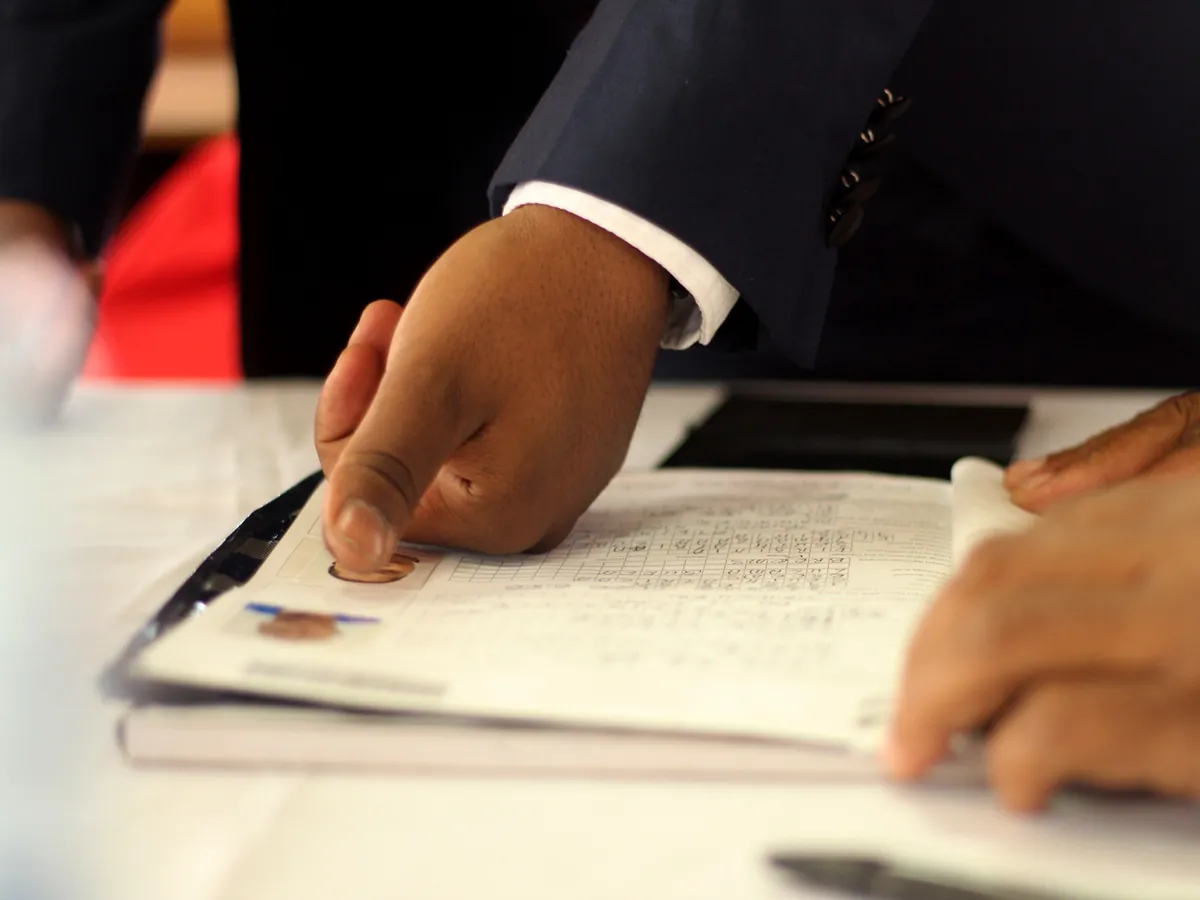 Fingerprint verification used to explain identity and KYC information